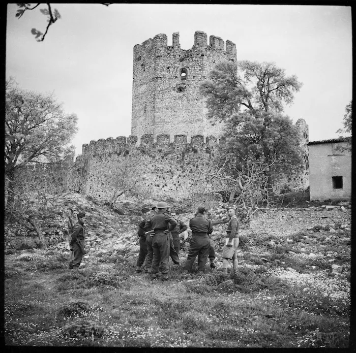 Castle at Platamon, Greece, and World War II soldiers in foreground