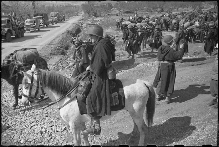 French Moroccan trooper astride a horse stands out on the Cassino Front in Italy, World War II - Photograph taken by George Kaye