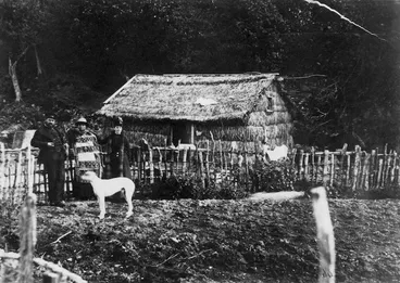 Image: Group alongside a whare at Karaka Bay, Wellington