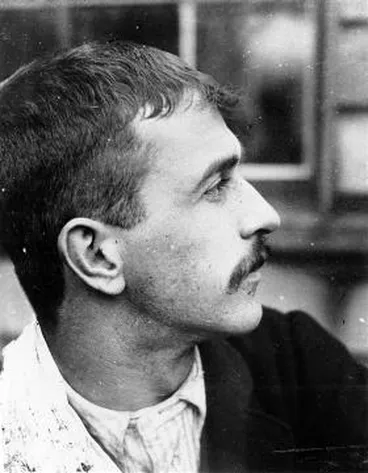 Image: A profile photograph of a man