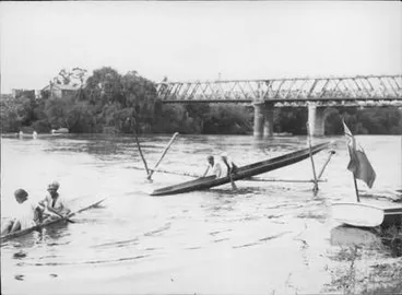 Image: Waikato River, Ngaruawahia. [Canoes & hurdle], bridge.