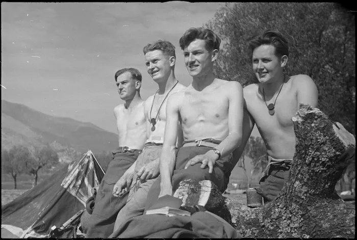 NZ Infantrymen rest immediately behind the line after the recent fighting for Cassino, Italy, World War II - Photograph taken by George Kaye