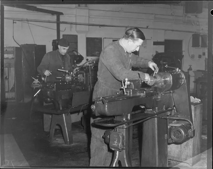 Leading Aircraftmen, B Carter and H Unwin working on lathes, Wigram, Christchurch