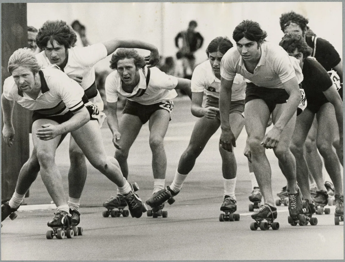 Roller skating championship competitors racing