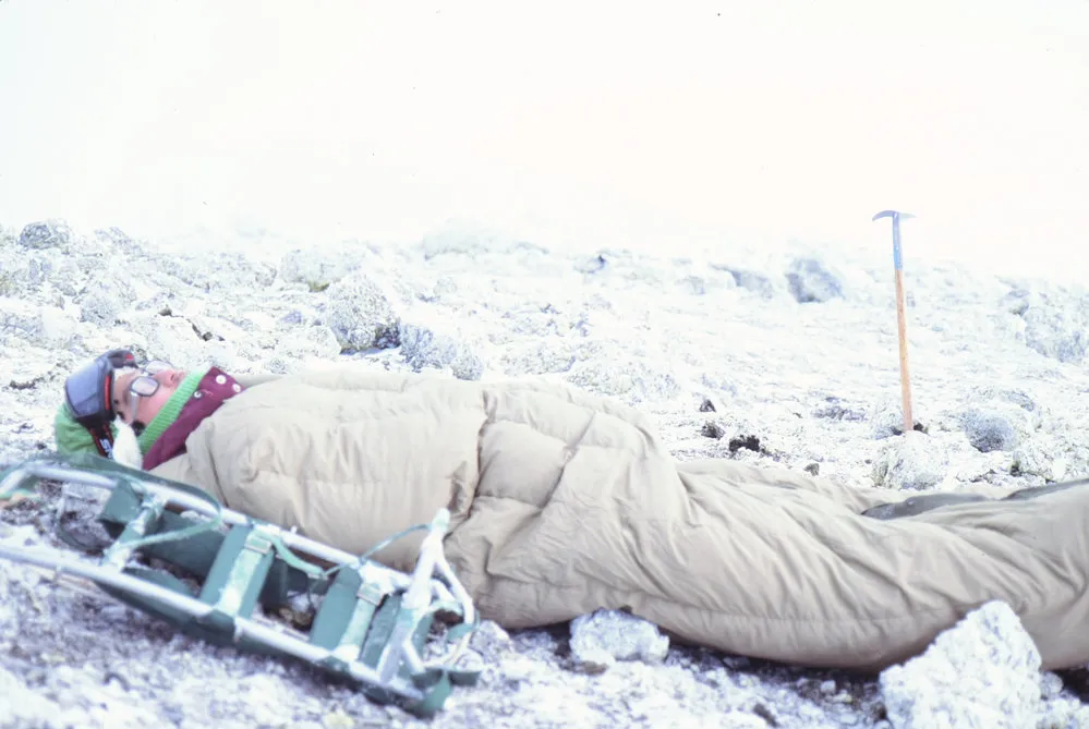 Japanese seismologist resting in spot where recorder is buried
