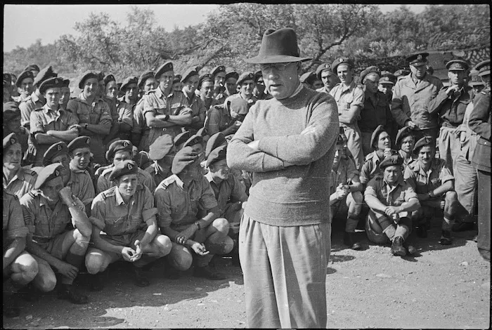 Prime Minister Peter Fraser with Sixth New Zealand Infantry Brigade members, Italy - Photograph taken by George Robert Bull