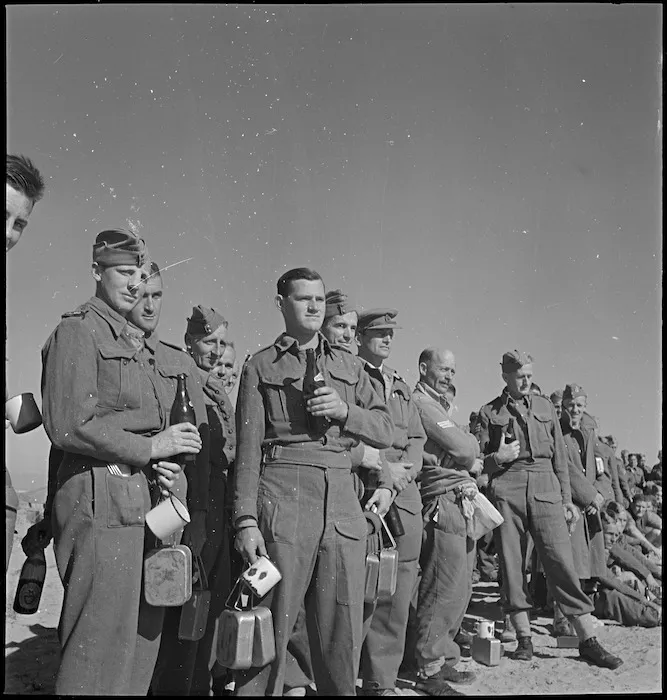 NZ troops during the GOC's visit and toast at Sirte, Libya, World War II