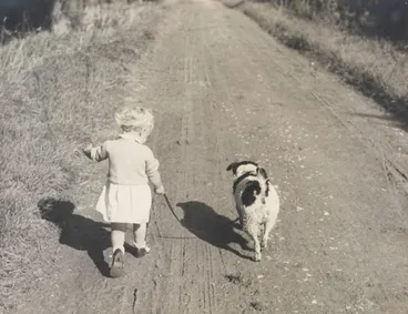 Image: Joanna Johnson and dog on country road, England