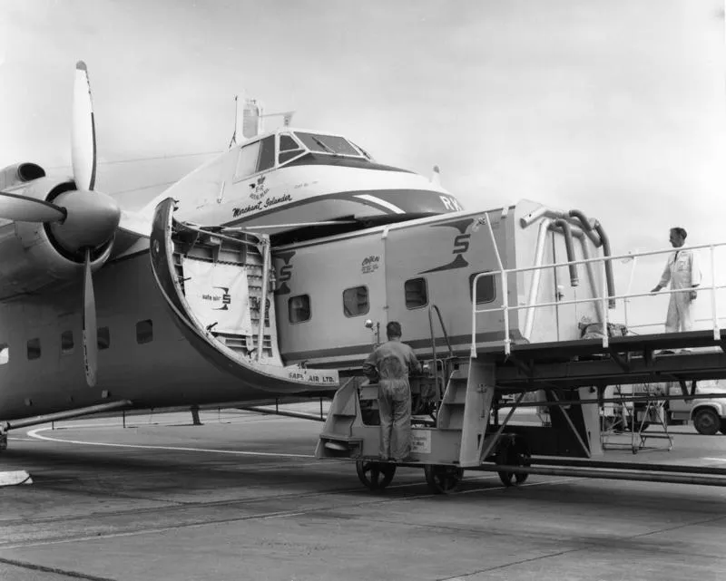 Safe Air Ltd passenger capsule for Chatham Islands flight being winched aboard at Woodbourne
