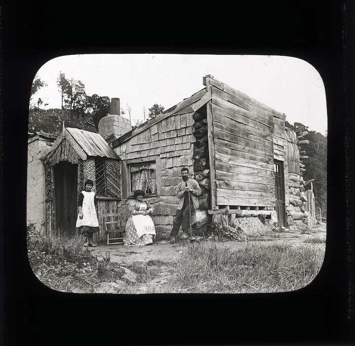 Lockwoods' house, and group outside, Taieri Mouth, Otago