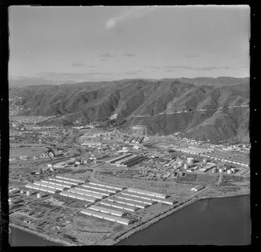 Image: Lower Hutt suburb of Seaview with the Ford Motors Plant, fuel storage tanks and other industrial buildings, with Wainuiomata access road beyond, Wellington Region