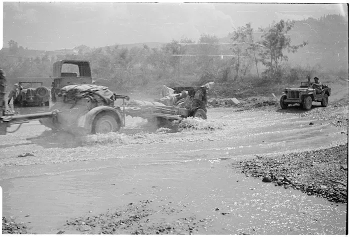 New Zealand gun being towed through the Pesa River, Tuscany, Italy - Photograph taken by George Kaye