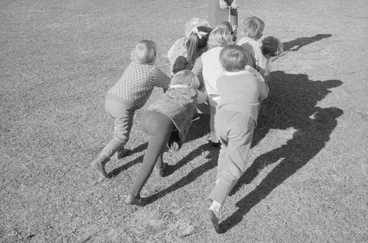 Image: Have shoes...will walk: children on a trolley