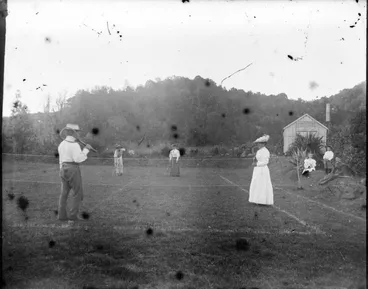 Image: Men and women playing tennis
