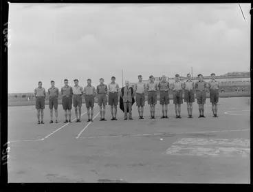 Image: A line of the tallest students at Rongotai College, Wellington, standing beside a teacher