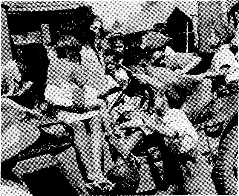 Children at a Japanese internment camp at Maymyo, east of Mandalay, in Burma, find a jeep a great attraction after they had been released following the arrival of the Allied 14th Army. (Evening Post, 05 May 1945)