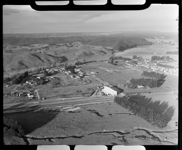 Tokoroa, South Waikato District, Waikato Region, including surrounding farmland and nearby pine forests