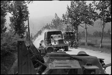 Image: Tanks and trucks on Highway 6 outside Cassino before it fell to the Allied assault, Italy, World War II - Photograph taken by George Kaye