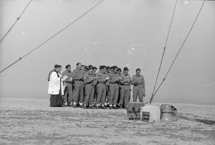 Kennewell, J :Maori choir singing at Sangro Military Cemetery, Italy, during World War II
