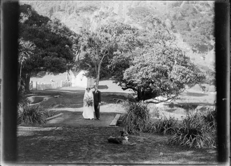 Bridal couple and dog