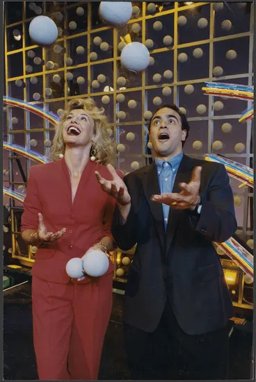 Image: Lotto draw presenters Hilary Timmins and Grant Kereama juggling balls - Photograph taken by Mark Coote