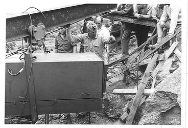 Image: Graeme Hastie directing operations while installing clock mechanism