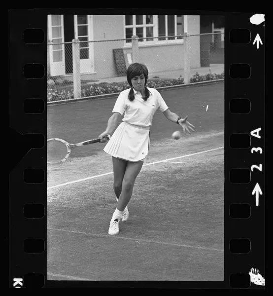 Christine Newton playing tennis