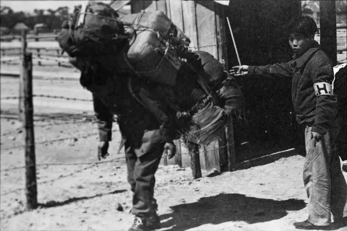 Korean repatriate loaded with belongings