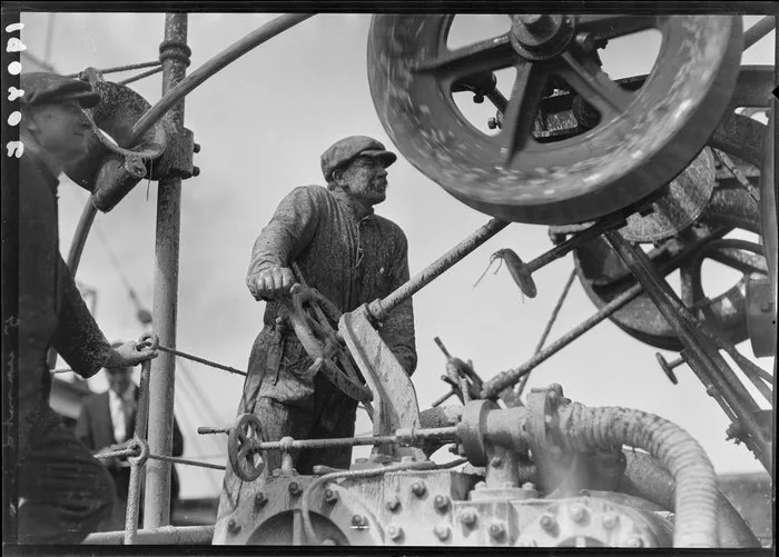 Unidentified man operating machinery
