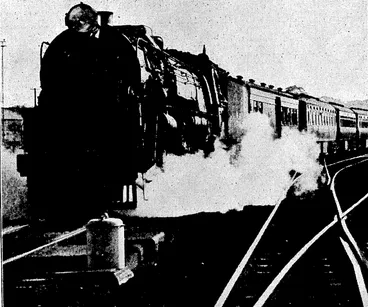 Image: Sport and General" Photo. 'DARING AIRMAN.—A parachutist about to \ open his safely equipment after' jumping from an ■ aeroplane. This photograph was taken during tests at Lctchworth, England .last month. . ■'.-'■ '" , . "Evening Post" Photo; MADE IN NEW ZEALAND.—TheK9OI, a New Zealand-made engine, drawing the Wellington-Auckland express. Some of these locomotives,built at the Hutt Railway Workshops, are'now, being used in drawing the express trains, .after having .been, tested in goods service. (Evening Post, 13 April 1933)