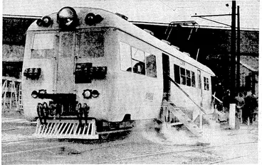 Image: The electric locomotive built by the English Electric Company at Preston, Lancashire, for the IVellington-Johnsonvilie line : The. photograph was taken when-the locomotive was- being.inspected by- the High Commissioner,-Mr^ W, J.i Jordan,; on December '13.v Others are ■■, . ... . . •'• • tarbe'built in New< Zealand. ' ..... (Evening Post, 04 January 1938)