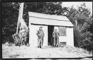 Image: John Cullen and Sir James Gunson outside the haunted whare at Tongariro National Park