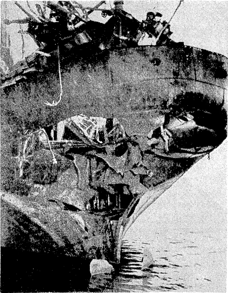 Stern of an Allied ship after it had been struck by a torpedo from a Japanese submarine off the south-east coast of Australia, After the attack, in which five men were killed and others injured, the submarine surfaced and the crew were ordered to abandon ship. They all returned, however, when the captain called for volunteers toman the ship, which iqas toived safely to port. (Evening Post, 11 September 1942)