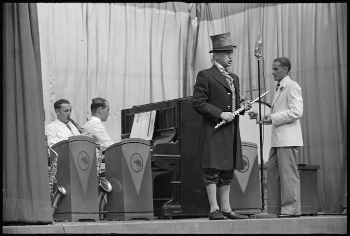 Ted Quill singing in a Kiwi Concert Party performance, Italy, World War II - Photograph taken by George Kaye
