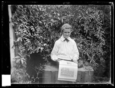 Image: Young boy in garden