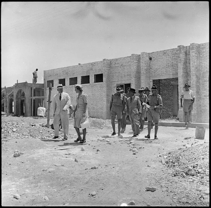 Prime Minister Peter Fraser and Mrs Chapman leaving the Lowry Hut, Egypt