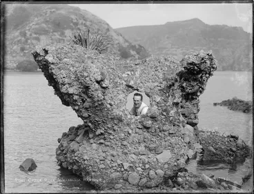 Image: Man at post office rock, Whangaroa Harbour, Northland region