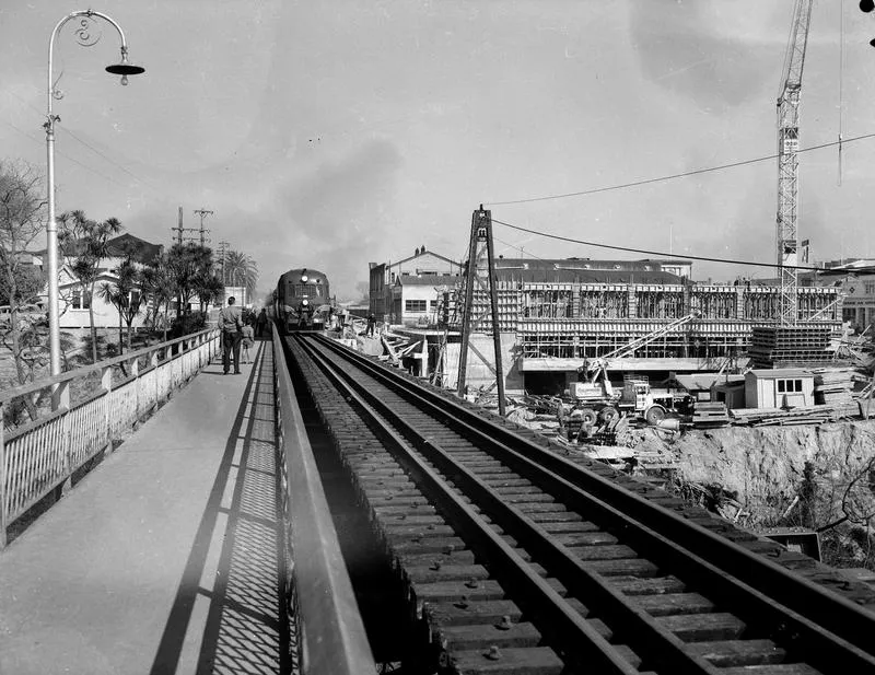Train crossing original railway bridge