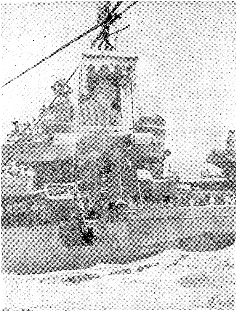 One of a group of Japanese harbour pilots who were used to bring the Allied fleet, safely into Sagarni Bay making the trip from the deck of the American destroyer Nicholas to that of the battleship Missouri in Admiral Halsey's ivell-decoratcd bos'n's chair. (Evening Post, 22 September 1945)
