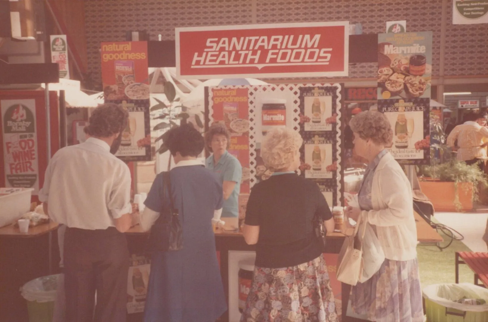Customers at a Sanitarium Health Foods stall