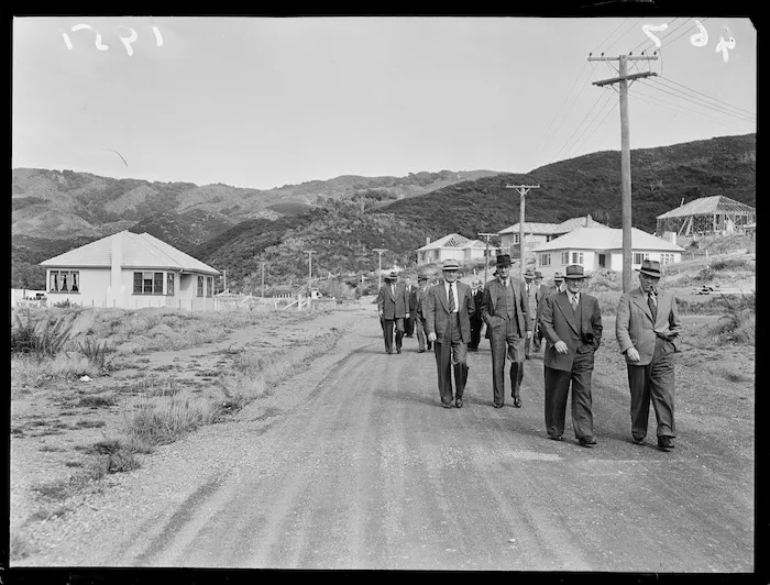 Group of men outside the Wainuiomata tunnel