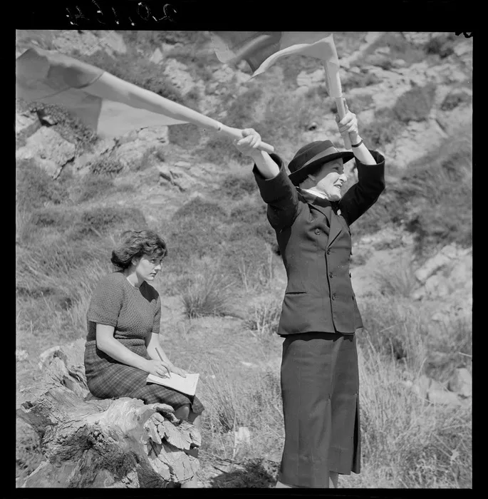 Women's Royal New Zealand Naval Service recruit learning semaphore on Somes Island