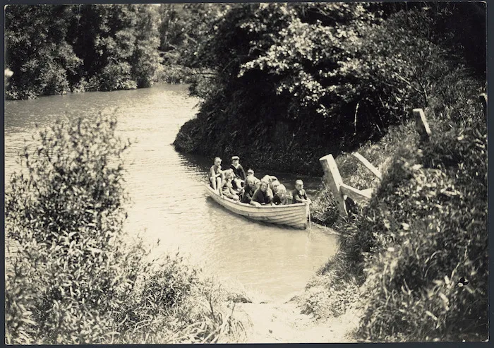 Children in a boat on the Mokau River