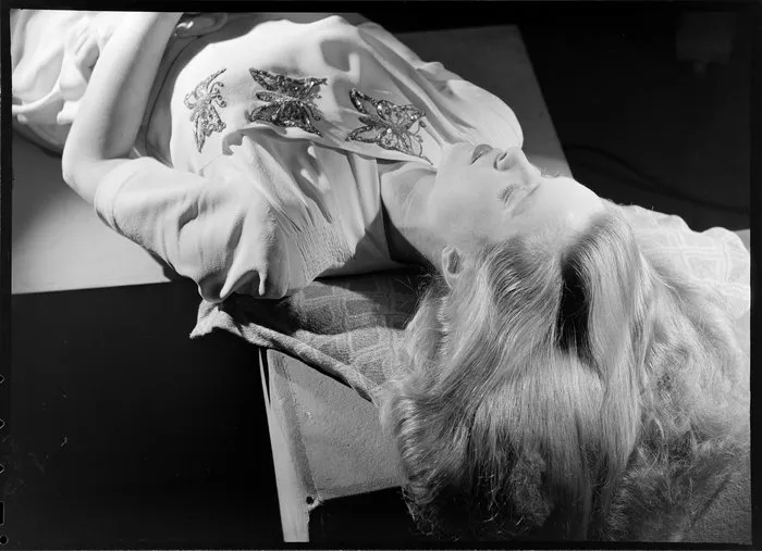 Miss Allen, model posing in studio