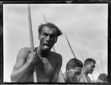 Image: A Maori man doing the pūkana during a performance, location unidentified