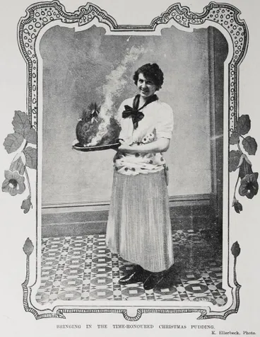 Image: BRINGING IN THE TIME-HONOURED CHRISTMAS PUDDING