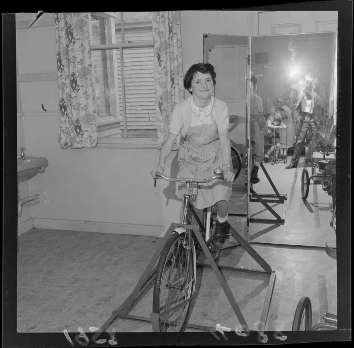 A student riding a stationary bike at Kimi Ora School for children with special needs, Thorndon, Wellington