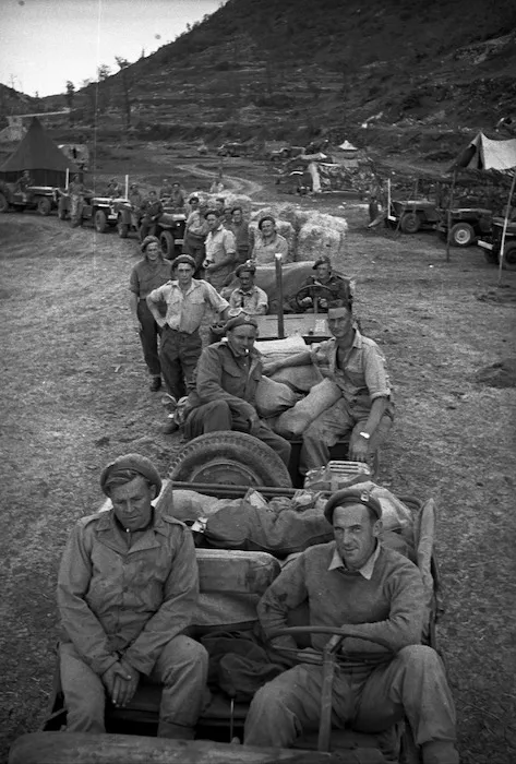 A convoy of jeeps, loaded with supplies for troops, Italy