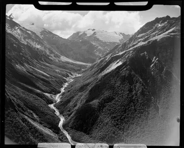 Image: River running through valley and tussock covered hills near Lake Ohau, Waitaki District, Canterbury Region