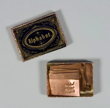 Image: Box of alphabet embroidery stencils